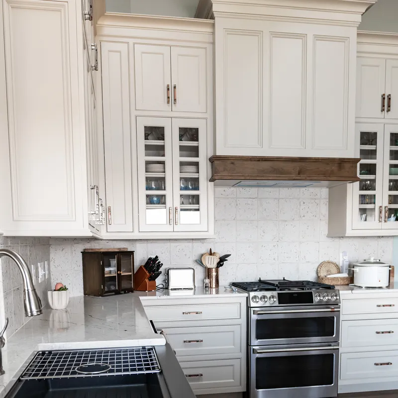 Cream kitchen cabinetry with copper accents, Columbus, OH area