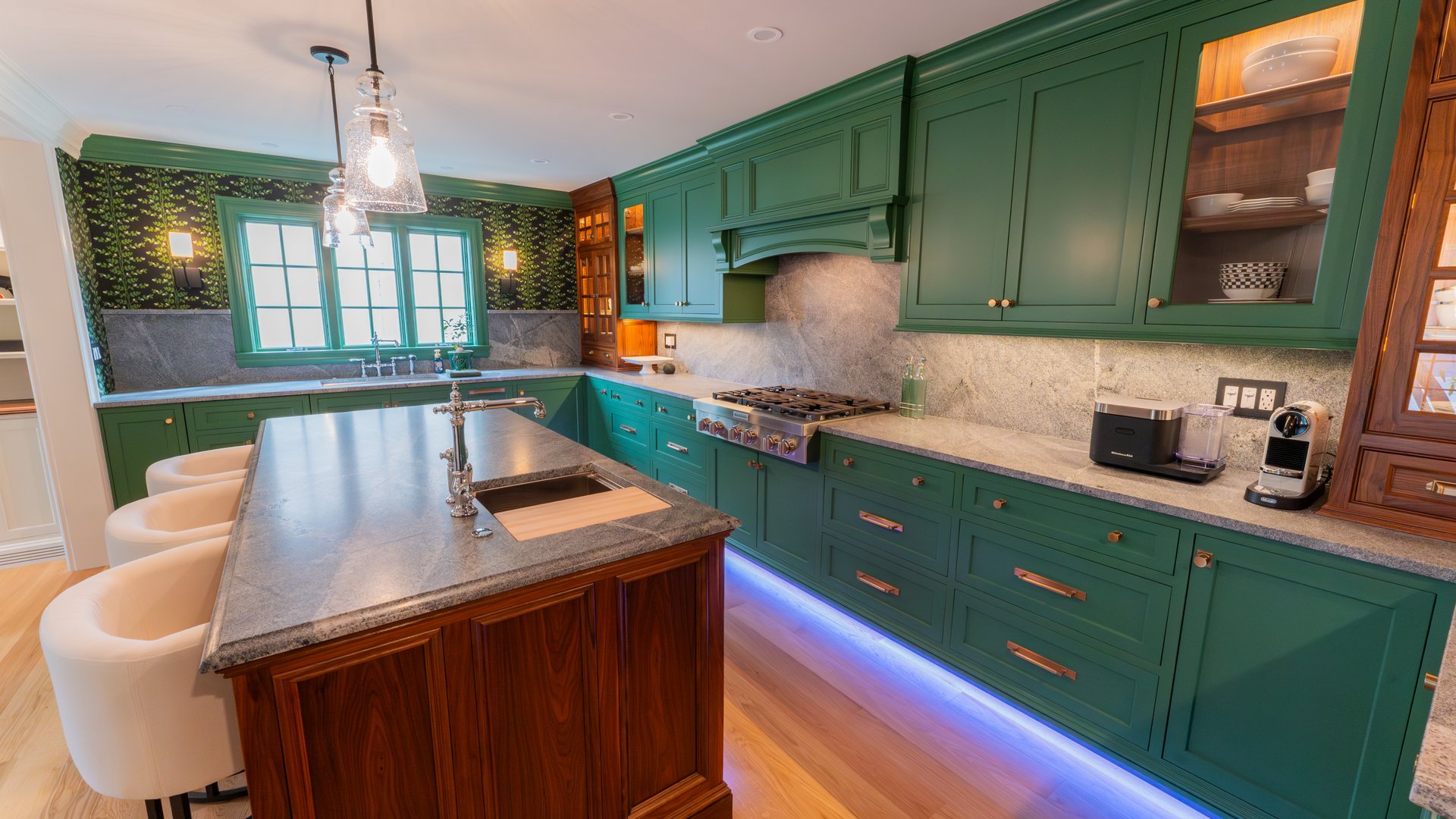Custom sage and walnut kitchen cabinetry by Lewis Designs