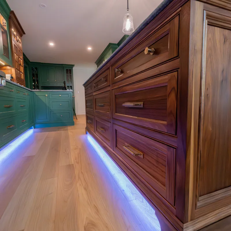 Walnut accents and sage cabinetry in custom kitchen, Columbus, OH area