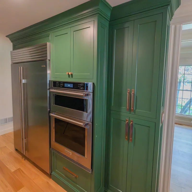 Custom kitchen cabinetry and trim in sage and walnut, Columbus, OH area