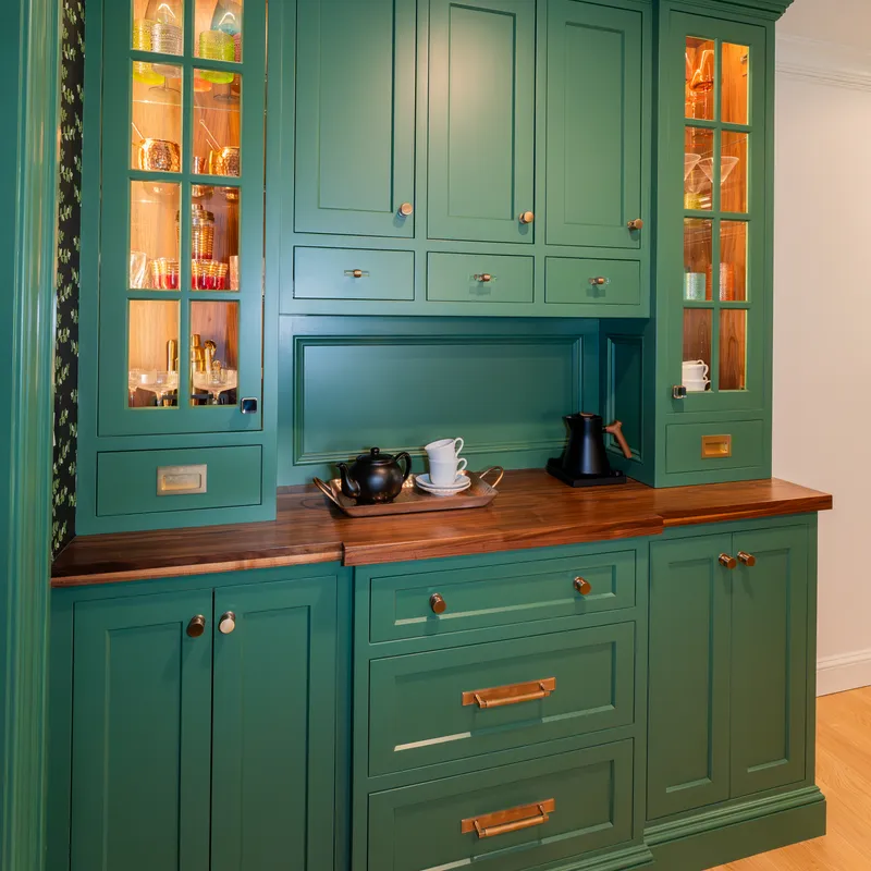 Custom walnut kitchen accents and sage cabinetry, Columbus, OH area
